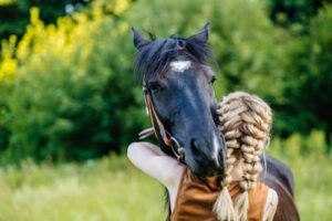 teenage girl with horse for equine therapy
